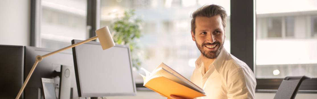 man with notebook
